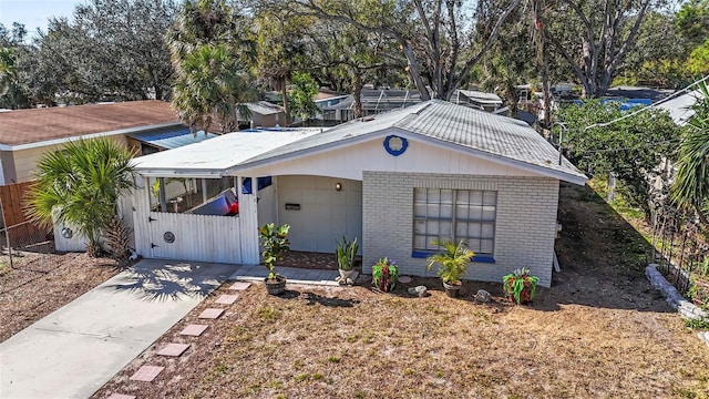 view of front facade with a carport