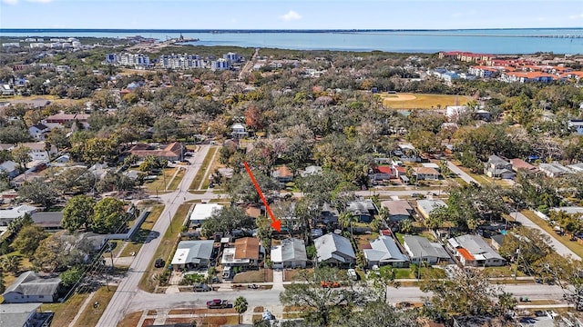 birds eye view of property featuring a water view