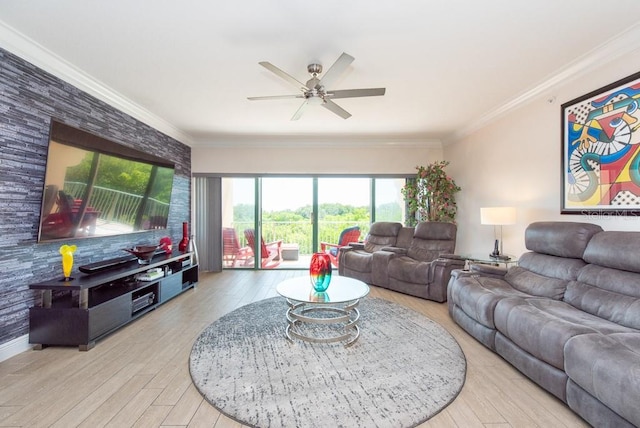 living room featuring ornamental molding, ceiling fan, and light hardwood / wood-style flooring