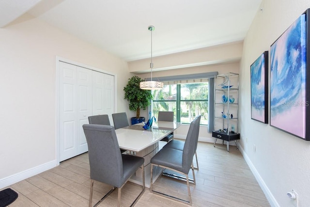 dining area with light wood-type flooring