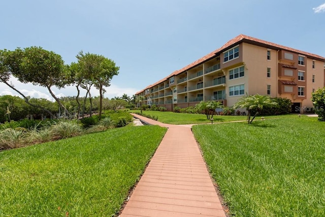 view of community with a lawn