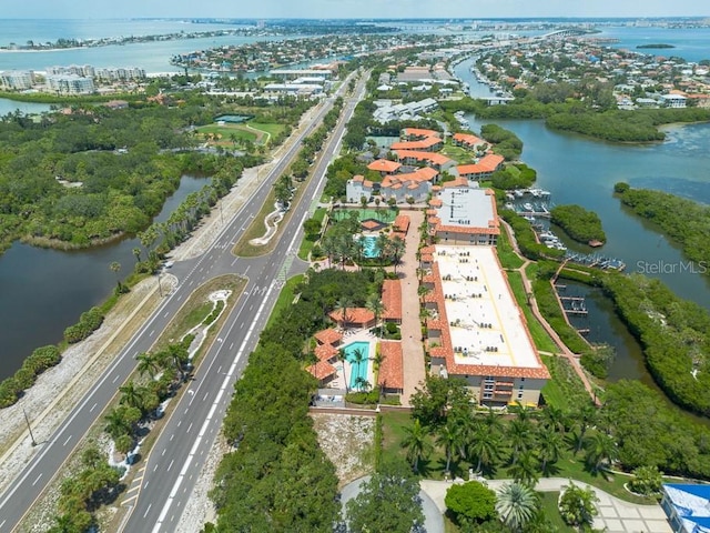 birds eye view of property featuring a water view