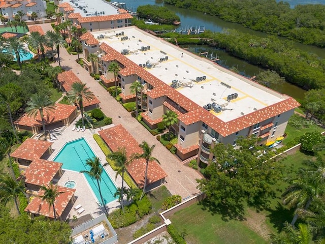 birds eye view of property with a water view