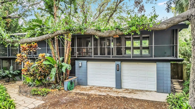 exterior space with a garage