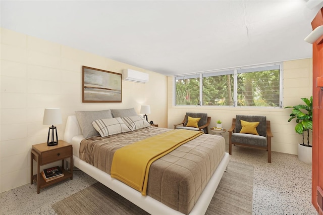 bedroom featuring an AC wall unit