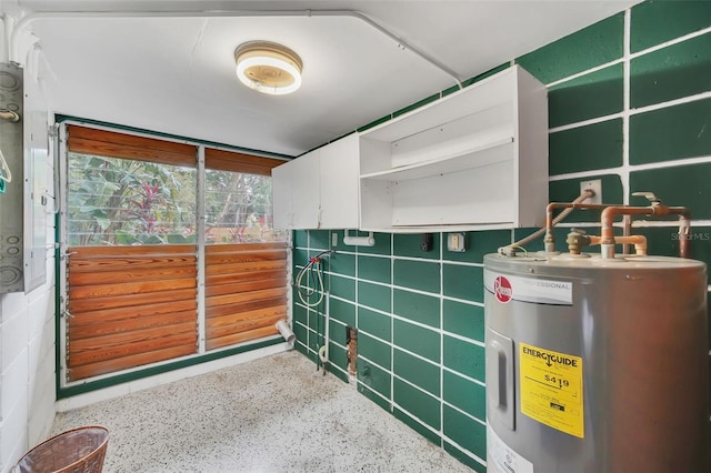 utility room with water heater