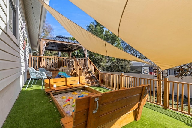 deck with a yard and a gazebo