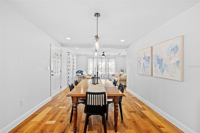 dining space with light wood-type flooring