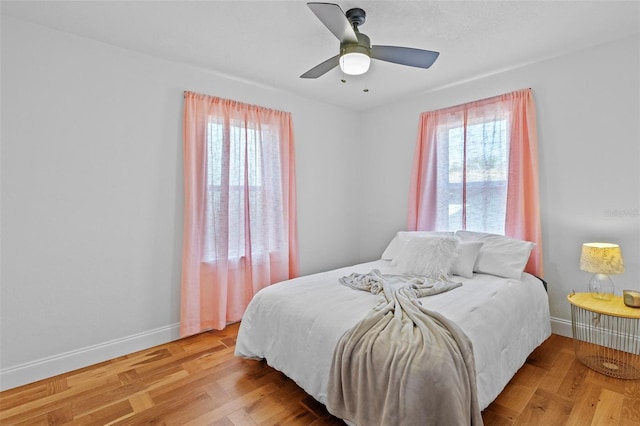 bedroom featuring ceiling fan and light wood-type flooring