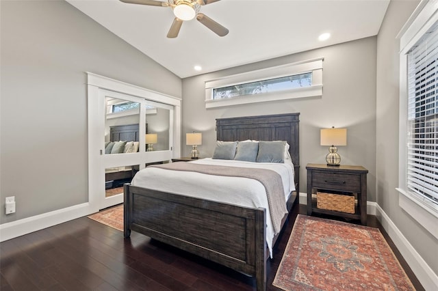 bedroom featuring lofted ceiling, dark hardwood / wood-style floors, and ceiling fan