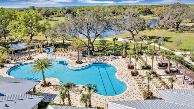 view of swimming pool with a patio area