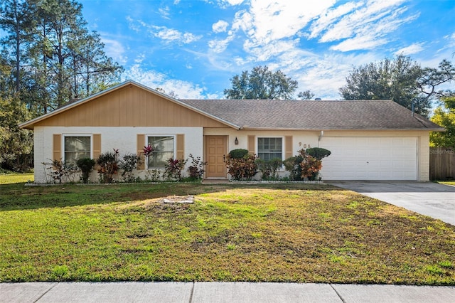 single story home with a garage and a front yard