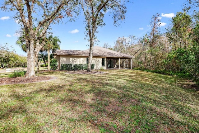 exterior space with a front yard