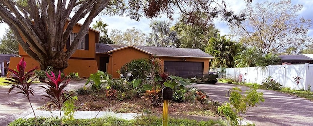 13824 Cherry Brook Ln, Tampa, FL 33618 - view of front facade with a garage
