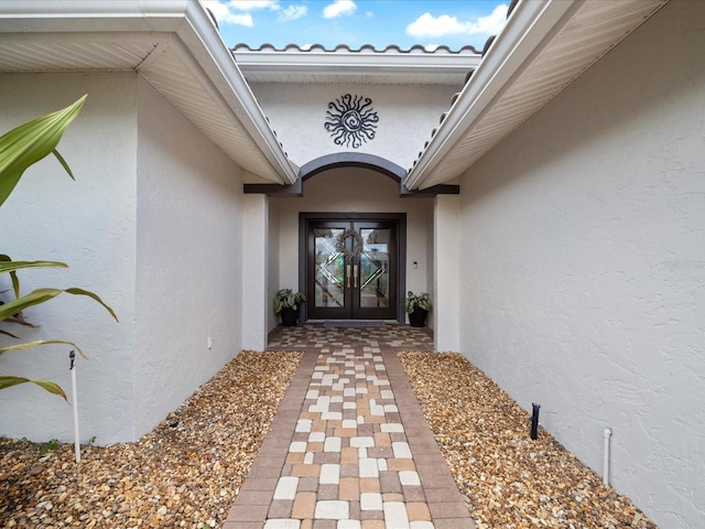 entrance to property featuring french doors