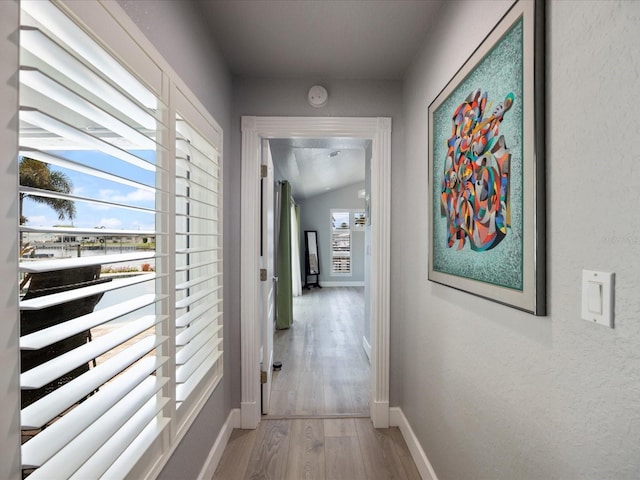 hallway featuring light hardwood / wood-style flooring