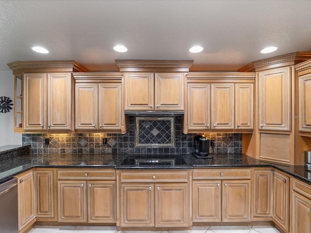 kitchen with light tile patterned flooring, dark stone counters, stainless steel dishwasher, black electric stovetop, and backsplash