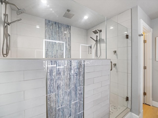 bathroom featuring an enclosed shower