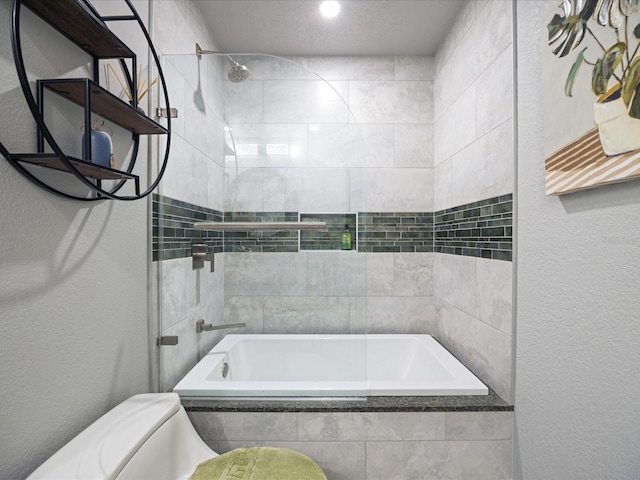 bathroom featuring tiled shower / bath combo