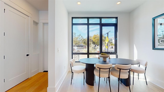 dining room featuring light wood-type flooring