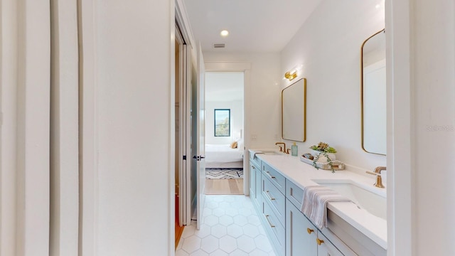 bathroom featuring vanity and tile patterned flooring