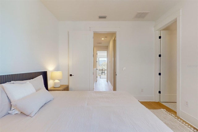 bedroom featuring light hardwood / wood-style flooring