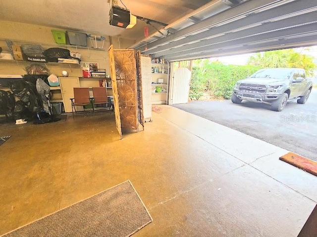 garage featuring a garage door opener