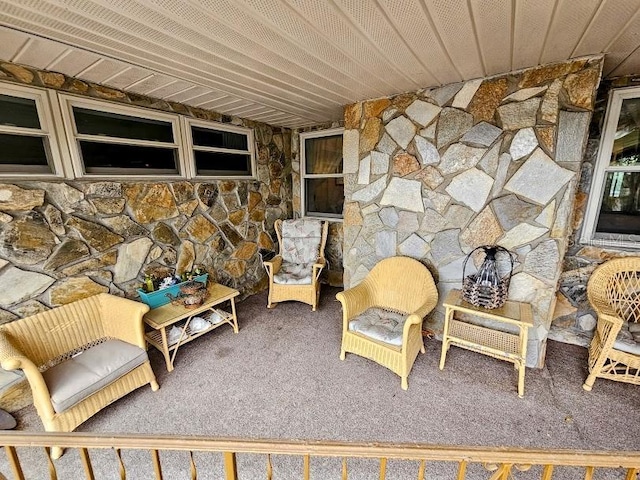 sitting room with carpet floors