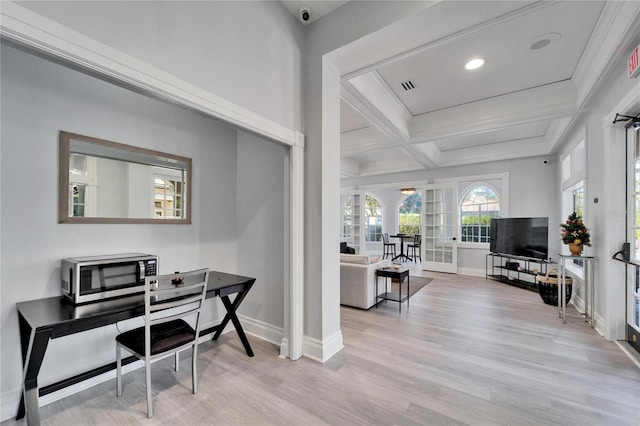 office featuring light hardwood / wood-style flooring, beam ceiling, coffered ceiling, ornamental molding, and french doors