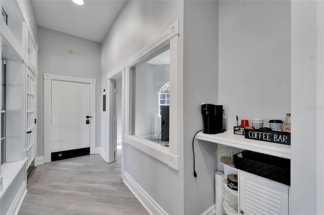 hall featuring light hardwood / wood-style floors