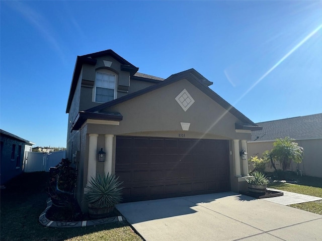 view of front of property featuring a garage