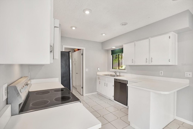 kitchen with white cabinetry, appliances with stainless steel finishes, sink, and kitchen peninsula