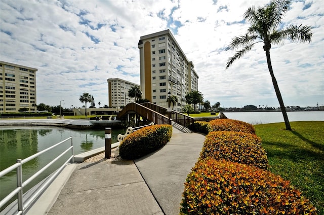 view of home's community with a water view