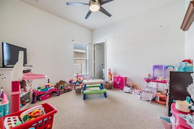 rec room featuring carpet and ceiling fan