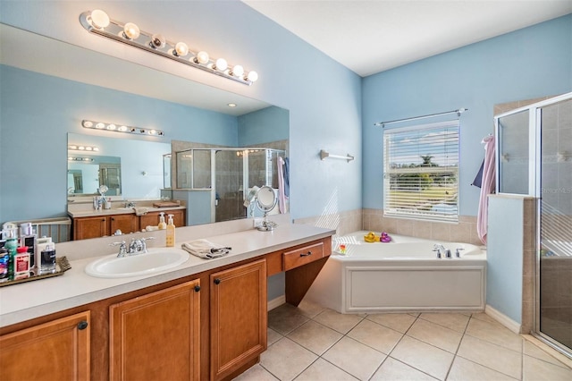 bathroom with vanity, tile patterned floors, and separate shower and tub