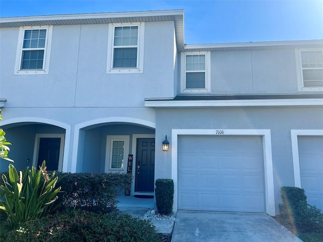 view of front of home with a garage