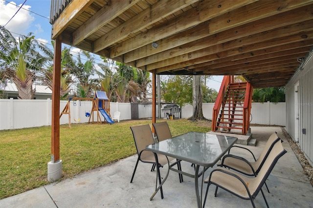 view of patio featuring a playground