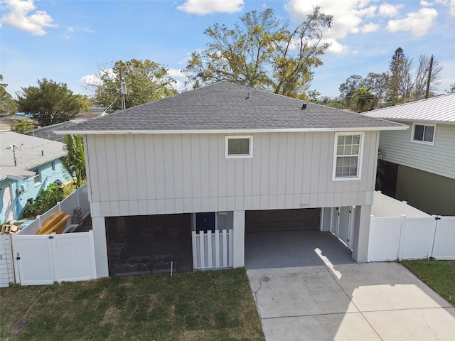 view of side of home featuring a garage