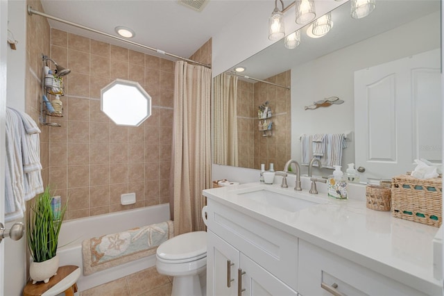 full bathroom with shower / bath combination with curtain, vanity, tile patterned floors, and toilet