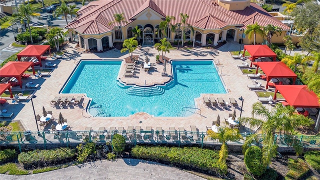 view of swimming pool featuring a patio area