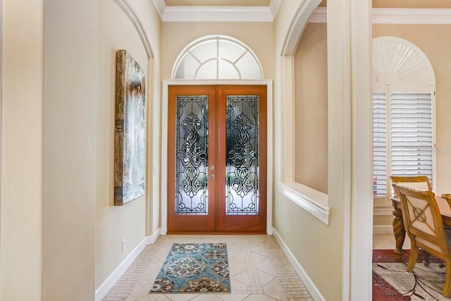 2867 Grey Oaks Blvd, Tarpon Springs, FL 34688 - tiled entrance foyer featuring crown molding, plenty of natural light, and french doors