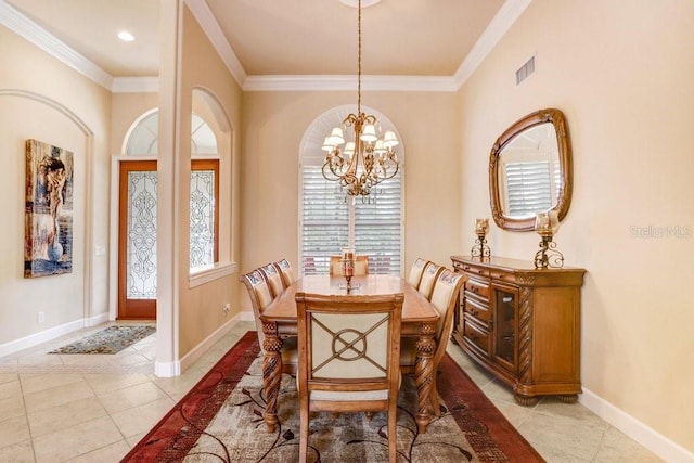 2867 Grey Oaks Blvd, Tarpon Springs, FL 34688 - tiled dining room with crown molding and a chandelier