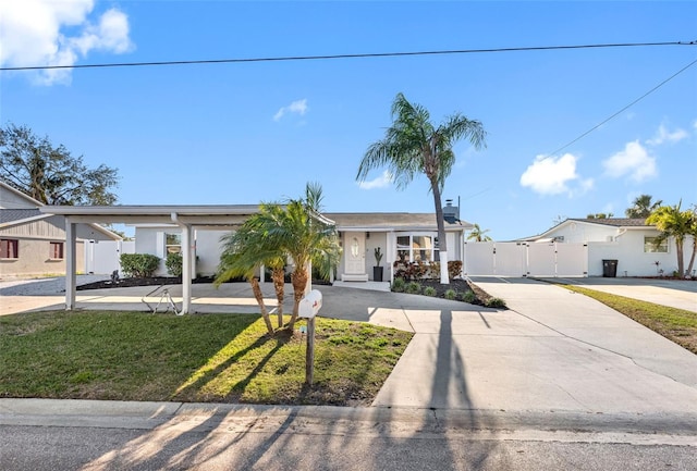 single story home featuring a front yard