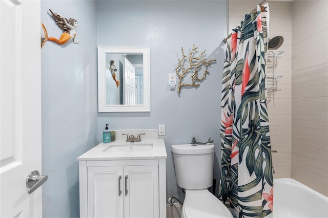 full bathroom featuring vanity, shower / tub combo, and toilet