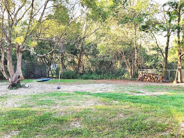 view of yard featuring fence