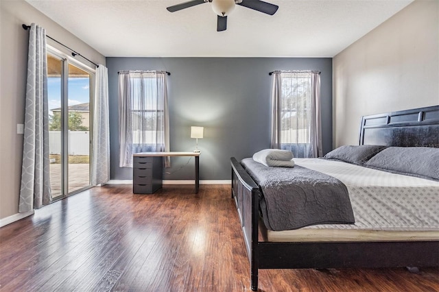 bedroom with dark wood-type flooring, access to outside, and ceiling fan