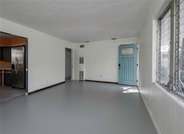 empty room with concrete floors