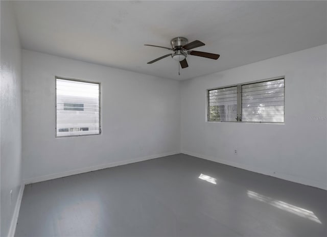 unfurnished room featuring ceiling fan