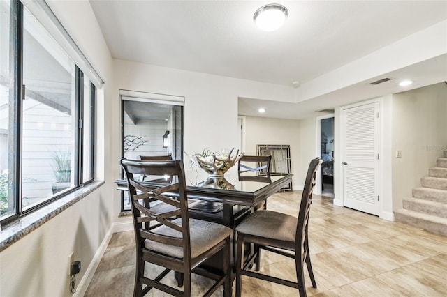 dining room with light tile patterned floors