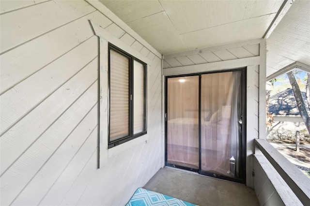 entrance to property with a balcony